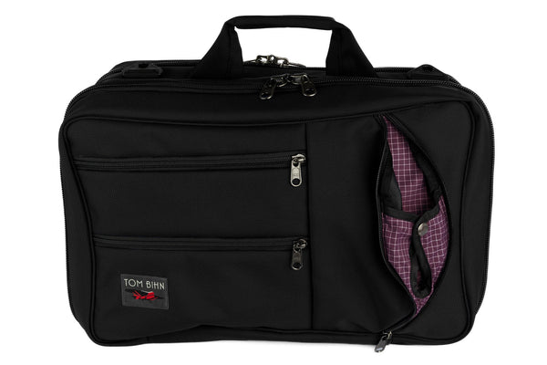 A Western Flyer in Black 1050 Ballistic with a Acai 200 Halcyon (dark purple with white grid) interior.